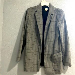 Gray checkered target blazer.
